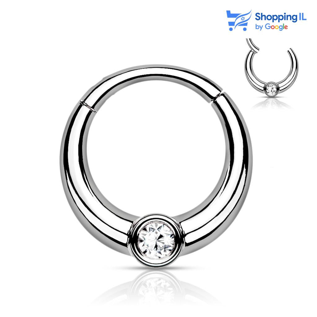 חישוק פז- עגיל חישוק עשוי מתכת רפואית עם סגירת קליקר. העגיל בעיצוב חישוק בצבע זהב רוז ומשובץ אבן זרקון מהפטנטת. צבע - זהב רוז, כסף מידה - מגיע בעובי של 1.2 מ"מ ובקוטר 8 מ"מ  העגיל מיועד בעיקר לאזורים הבאים: - פירסינג הליקס - פירסינג טראגוס - פירסינג ספטום - כמובן שניתן לענוד את העגיל גם באזורים אחרים (: