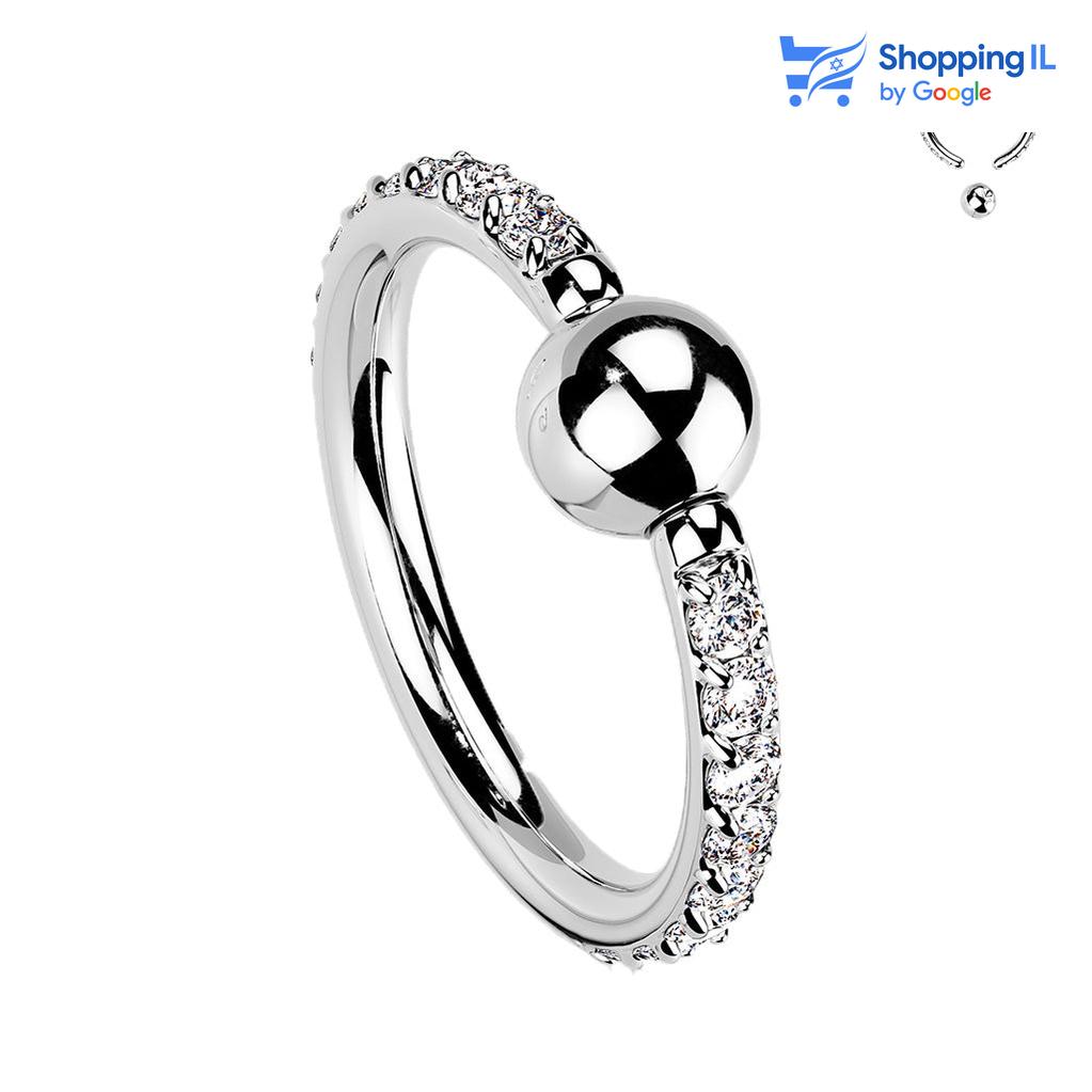 חישוק לחץ משובץ זירקונים- עגיל לחץ עשוי טיטניום TITANIUM 6AL-4V-ELI ASTM F-136 בציפי PVD. העגיל בעיצוב עגיל לחץ משובץ באבני זירקון. צבע - כסוף, זהב מידה - מגיע בעובי של 1.2 מ"מ ובקוטר 10 מ"מ. קוטר סוגר - 3 מ"מ  העגיל מיועד בעיקר לאזורים הבאים: - פירסינג ספטום - פירסינג פיטמה - פירסינג קונץ' - פירסינג בטבור - כמובן שניתן לענוד את העגיל גם באזורים אחרים (: