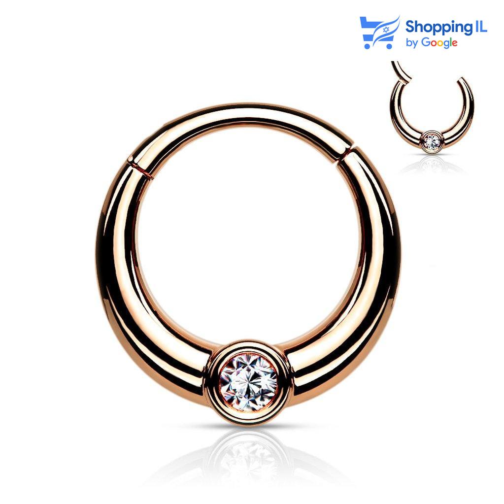 פז - Labass -  חישוק פז- עגיל חישוק עשוי מתכת רפואית עם סגירת קליקר. העגיל בעיצוב חישוק בצבע זהב רוז ומשובץ אבן זרקון מהפטנטת. צבע - זהב רוז, כסף מידה - מגיע בעובי של 1.2 מ"מ ובקוטר 8 מ"מ  העגיל מיועד בעיקר לאזורים הבאים: - פירסינג הליקס - פירסינג טראגוס - פירסינג ספטום - כמובן שניתן לענוד את העגיל גם באזורים אחרים (: