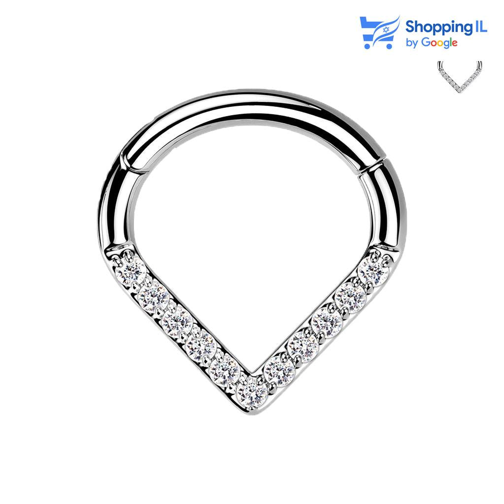 חישוק גריס- עגיל קליקר עשוי טיטניום. עגיל קליקר עשוי טיטניום בעיצוב טיפה הפוכה, משובצת באבני זירקון. צבע - כסף מידה - מגיע בעובי 1.2 מ"מ ובקוטר 8  העגיל מיועד בעיקר לאזורים הבאים: - פירסינג הליקס - פירסינג טראגוס - כמובן שניתן לענוד את העגיל גם באזורים אחרים (: