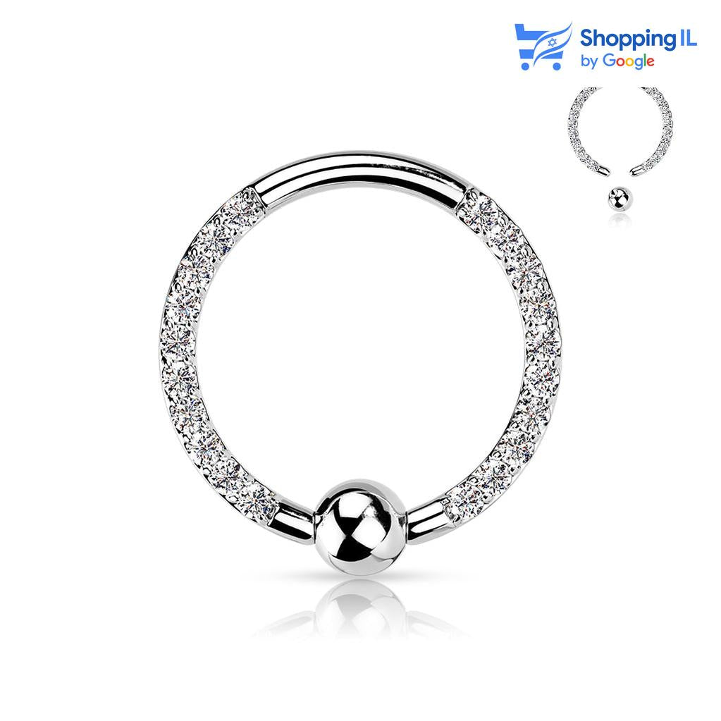 חישוק לחץ משובץ זירקונים- עגיל לחץ עשוי טיטניום TITANIUM 6AL-4V-ELI ASTM F-136 בציפי PVD. העגיל בעיצוב עגיל לחץ משובץ באבני זירקון. צבע - כסוף, זהב מידה - מגיע בעובי של 1.2 מ"מ ובקוטר 8 מ"מ. קוטר סוגר - 3 מ"מ  העגיל מיועד בעיקר לאזורים הבאים: - פירסינג ספטום - פירסינג טראגוס - פירסינג הליקס