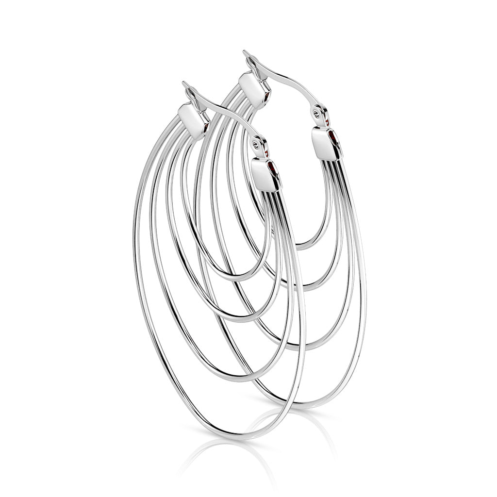 זוג עגילי אדווה - זוג עגילי חישוק עשויים מתכת רפואית . העגילים בעיצוב ארבעה חישוקים במידות שונות המחוברים יחד ויוצרים ביחד מראה של אדווה . צבע - כסוף מידה - מגיע בעובי של 0.8 מ"מ  העגילים מיועדים בעיקר לאזורים הבאים: - תנוך