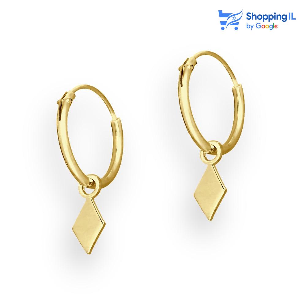 עגילי קסם- זוג עגילי חישוק עשויים כסף 925 מצופים זהב 18 קראט העגילים בעיצוב מעוין תלוי על חישוק. צבע - זהב מידה - מגיע בעובי מוט של 0.8 מ"מ ובקוטר 12 מ"מ מידות המעוין- 4/9 מ"מ  העגילים מיועדים בעיקר לאזורים הבאים: - עגילים בתנוך האוזן