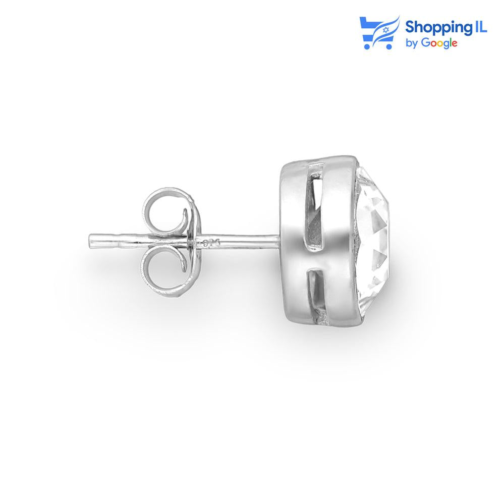 זוג עגילי "קאץ'" - עשויים מכסף סטרלינג 925 . זוג עגילים צמודים לתנוך האוזן משובצים בזוג קריסטלים אוסטריים. צבע- כסף מידה - מגיע בעובי של 0.8 מידת הקריסטלים 9 מ"מ  העגילים מיועדים בעיקר לאזורים הבאים: - תנוך