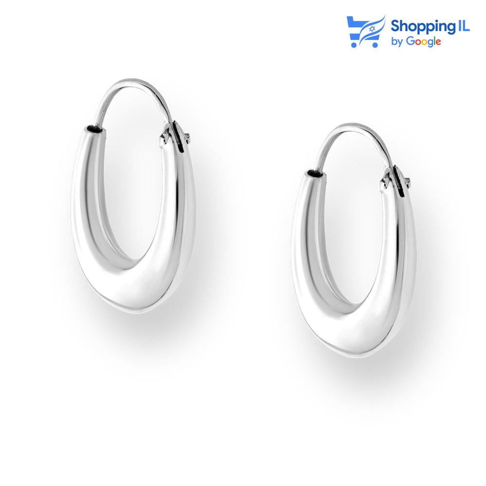 זוג עגילי קתרין - עגילי חישוק העשויים כסף 925 העגילים בגודל בינוני ובעיצוב מיוחד שלא רואים כל יום!. צבע - כסף מידה - מגיע בעובי מוט של 0.8 מ"מ מידה 22/20 מ"מ רוחב חישוק - 5 מ"מ  העגיל מיועד בעיקר לאזורים הבאים: - עגילים בתנוך האוזן