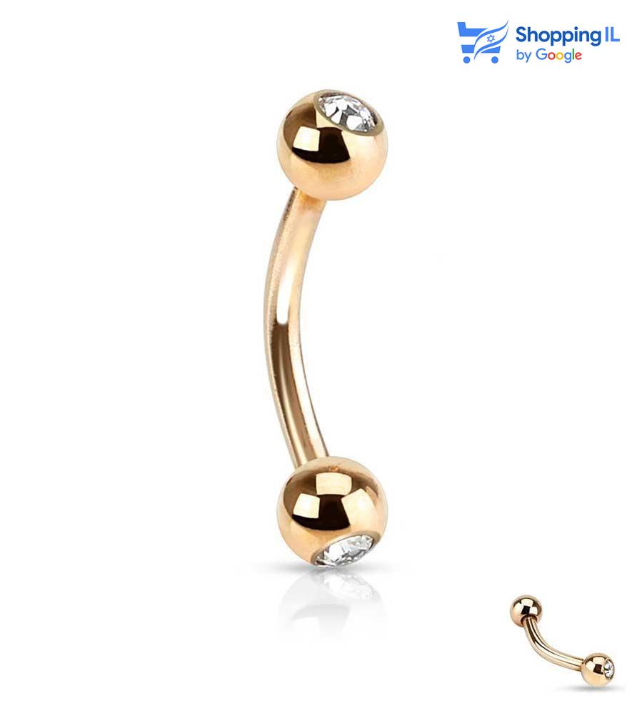 עגיל שוהם מצופה זהב - עגיל בננה עשוי מתכת רפואית מצופה בזהב רוז. העגיל בסגנון עגיל בננה משובץ זוג אבני זירקון בסוגרים. צבע - זהב רוז מידה - מגיע בעובי של 1.2 מ"מ ובאורך8/10 מ"מ קוטר סוגרים -3/4 מ"מ  העגיל מיועד בעיקר לאזורים הבאים: - פירסינג בגבה - פירסינג רוק - פירסינג בטבור (דק במידה מהסטנדרט) - כמובן שניתן לענוד את העגיל גם באזורים אחרים (: