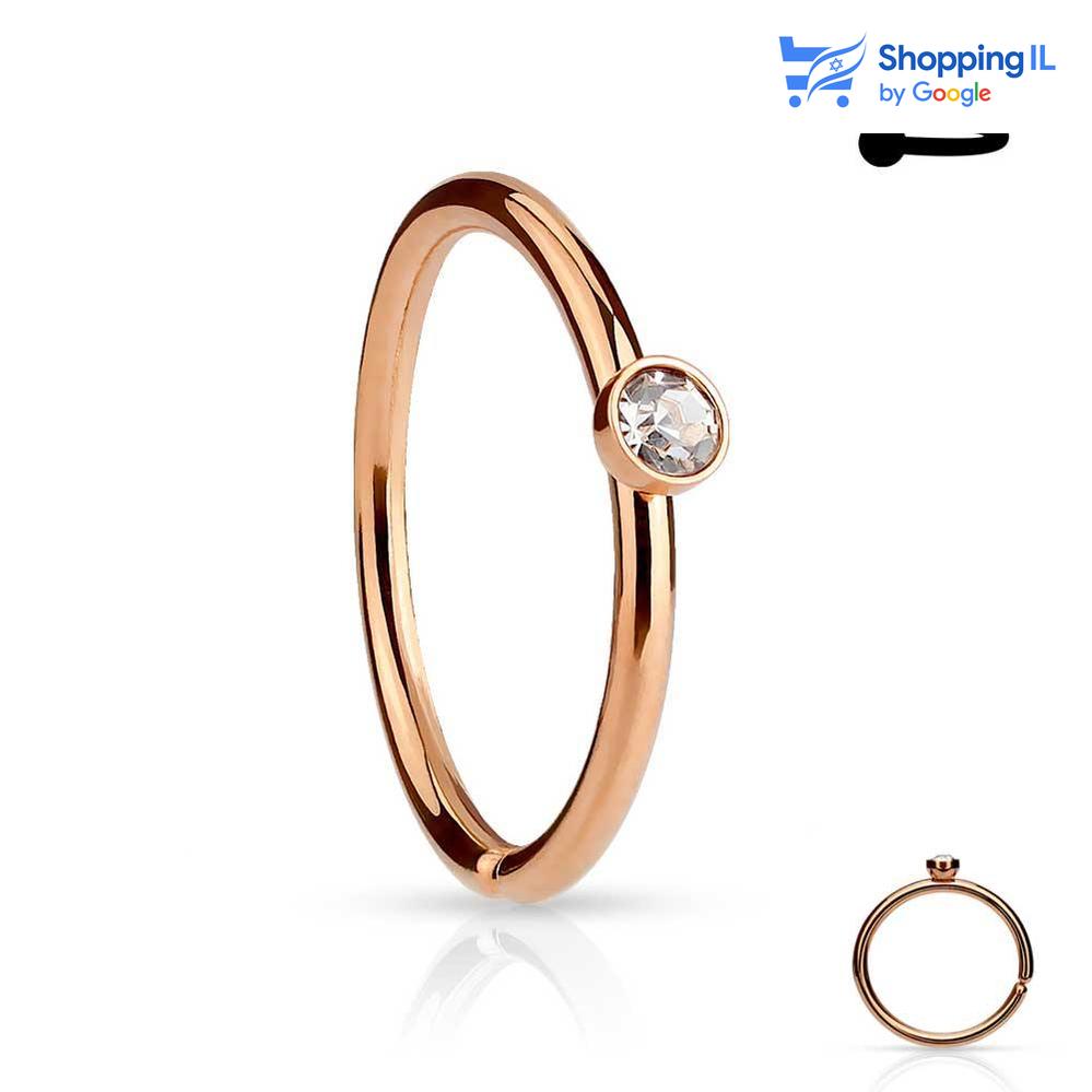 חישוק I DO - עגיל חישוק פתוח עשוי מתכת רפואית, סגירת החישוק מתבצעת בעזרת כיפוף. העגיל בעיצוב טבעת אירוסים משובצת אבן זירקון. צבע - כסוף, זהב, זהב רוז, שחור מידה - מגיע בעובי של 0.8  מ"מ ובקוטר 8 מ"מ  העגיל מיועד בעיקר לאזורים הבאים: - פירסינג נזם - הליקס דק שנעשה בעזרת אקדח nose ring - helix - piercing