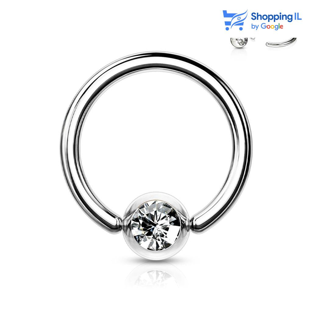 חישוק לחץ משובץ קריסטל- עגיל לחץ עשוי מתכת רפואית. העגיל בעיצוב עגיל לחץ עם סוגר משובץ קריסטל. צבע - כסוף מידה - מגיע בעובי של 1.2/1.6 מ"מ ובקוטר 6/8/10 מ"מ. קוטר סוגר - 3 מ"מ  העגיל מיועד בעיקר לאזורים הבאים: - פירסינג הליקס - פירסינג טראגוס