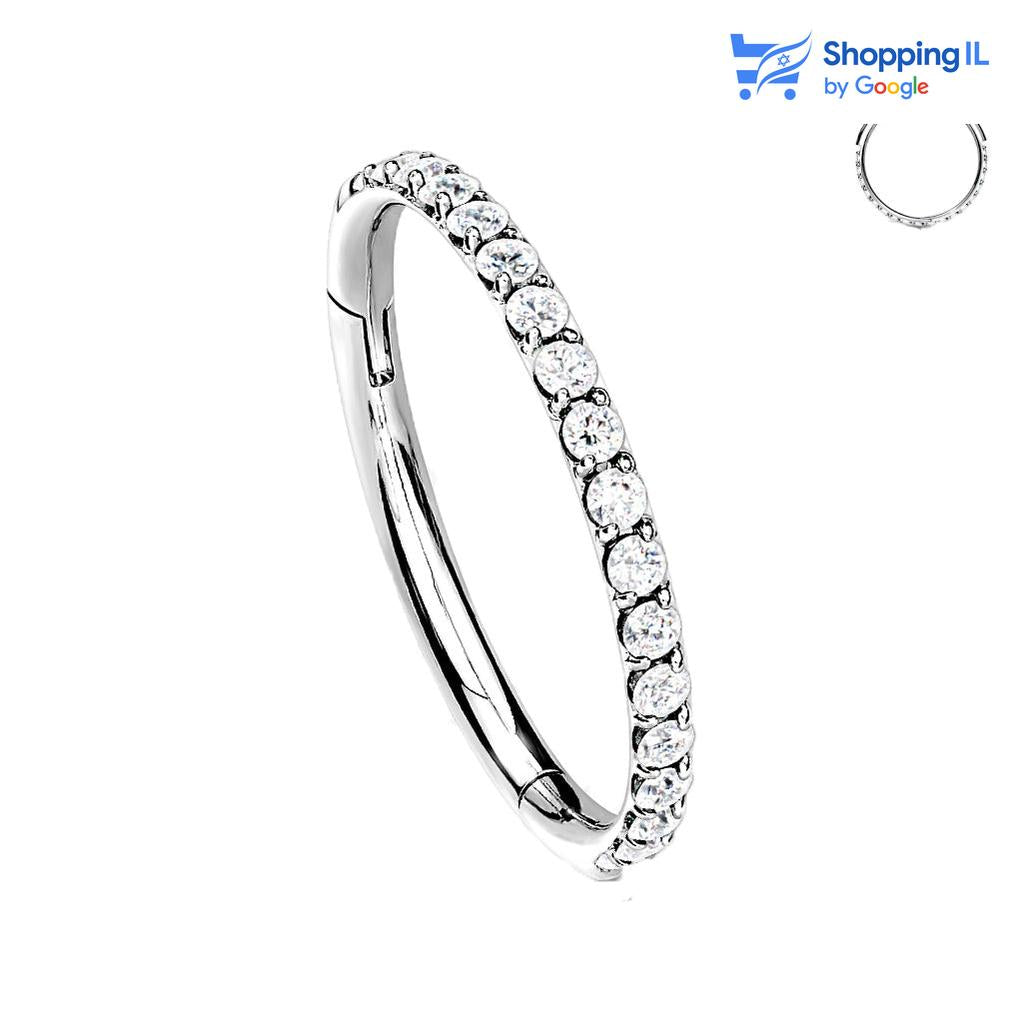 חישוק סיאנה טיטניום- חישוק סיאנה עשוי טיטניום עם סגירת קליקר. העגיל בעיצוב חישוק קליקר דק ומשובץ באבני זירקון. צבע - כסף מידה - מגיע בעובי של 1 מ"מ ובקוטר 10 מ"מ  העגיל מיועד בעיקר לאזורים הבאים: - פירסינג הליקס - פירסינג דיית' - פירסינג ספטום - פירסינג בטבור - פירסינג קונץ' - כמובן שניתן לענוד את העגיל גם באזורים אחרים (: