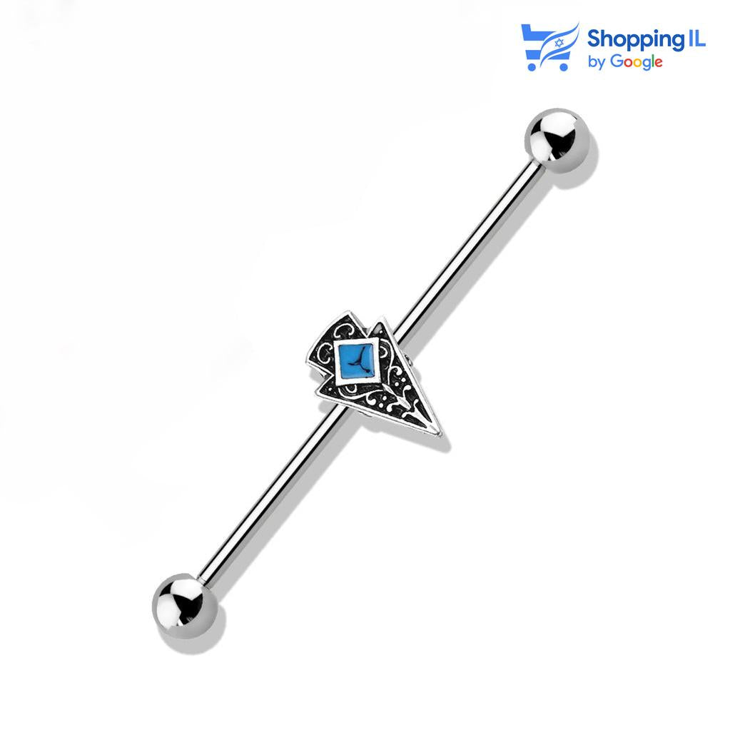 עגיל אינדסטריאל דוג' - עשוי מתכת רפואית. העגיל בעיצוב מוט עם כידון באמצע העגיל המשובץ באבן טורקיז. צבע - כסף עתיק, טורקיז מידה - מגיע בעובי 1.6 מ"מ ובאורך 38 מ"מ  העגיל מיועד בעיקר לאזורים הבאים: - פירסינג אינדסטריאל 