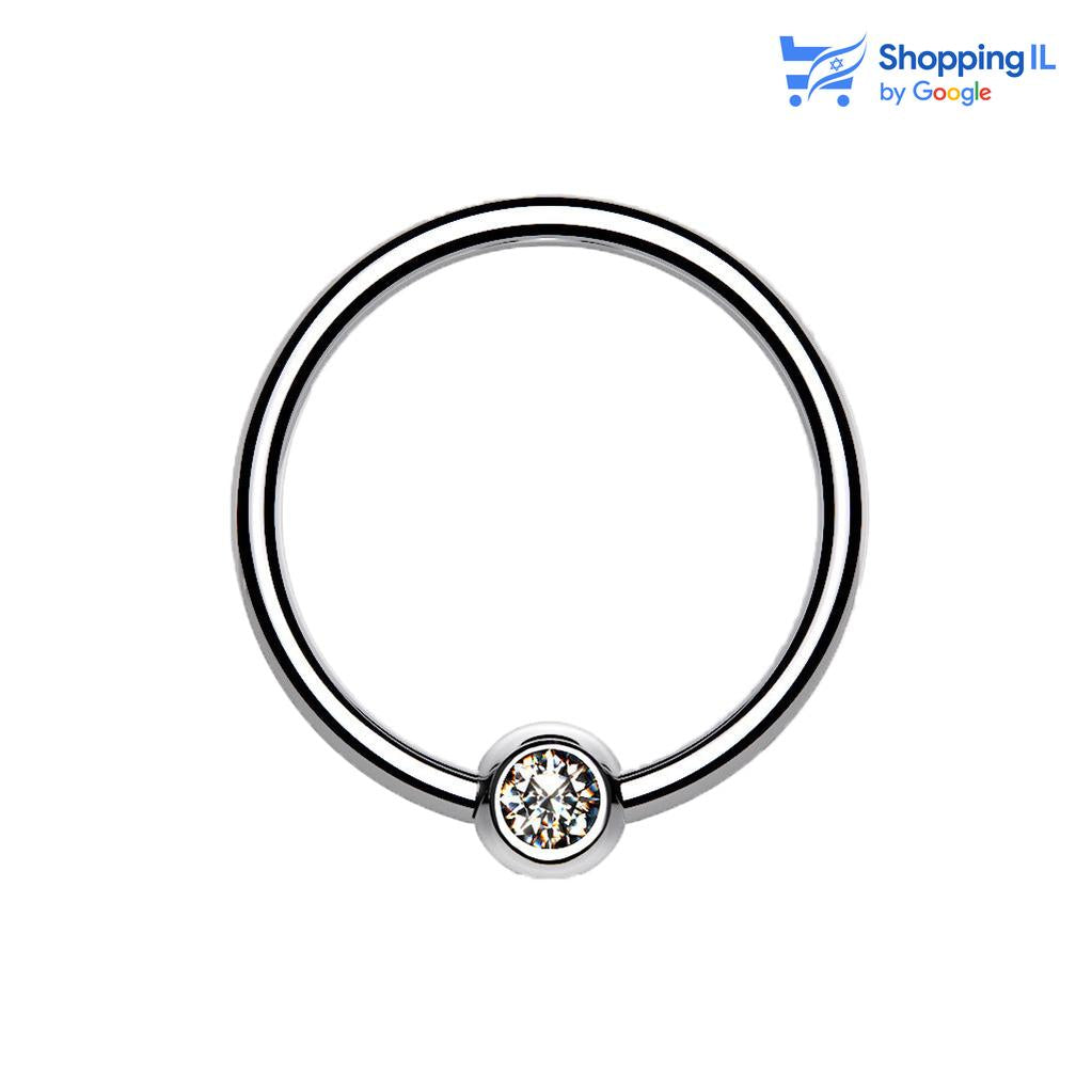 חישוק לחץ משובץ זירקון- עגיל לחץ עשוי טיטניום. העגיל בעיצוב עגיל לחץ עם סוגר משובץ באבן זירקון. צבע - כסוף מידה - מגיע בעובי של 1.2 מ"מ ובקוטר 8/10 מ"מ. קוטר סוגר - 3,4 מ"מ  העגיל מיועד בעיקר לאזורים הבאים: - פירסינג הליקס - פירסינג טראגוס - פירסינג ספטום - פירסינג קונץ' - פירסינג דיית' - כמובן שניתן לענוד את העגיל גם באזורים אחרים (: