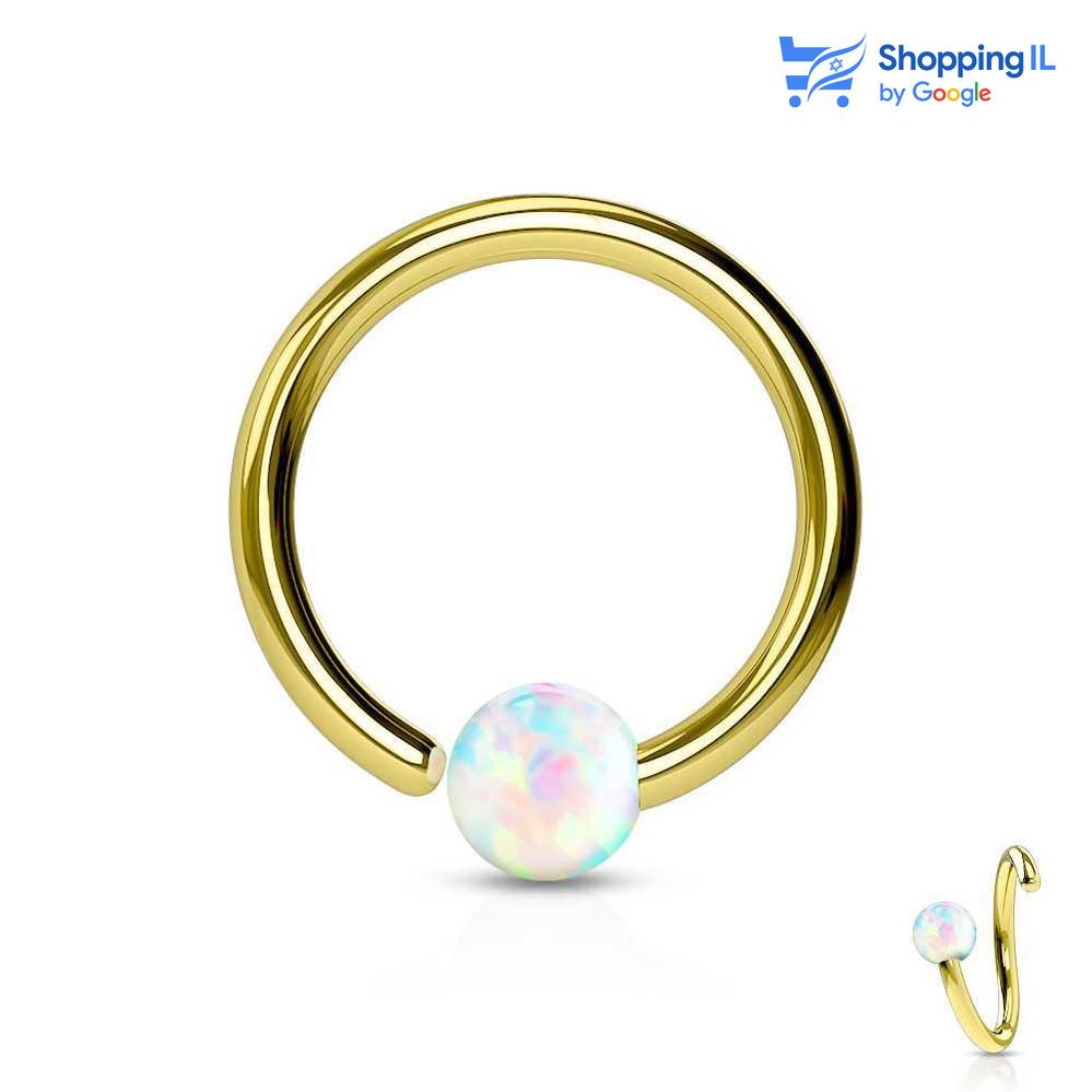 חישוק קארמה נזם מצופה זהב - עגיל דמוי לחץ עשוי מתכת רפואי מצופה בזהב, סגירת החישוק מתבצעת בעזרת כיפוף. העגיל בעיצוב חישוק פתוח עם אבן אופל באמצע. מצופה- זהב מידה - מגיע בעובי של0.8 מ"מ ובקוטר 6/8 מ"מ קוטר אופל - 2 מ"מ  העגיל מיועד בעיקר לאזורים הבאים: - פירסינג נזם - פירסינג הליקס שנעשה בעזרת אקדח