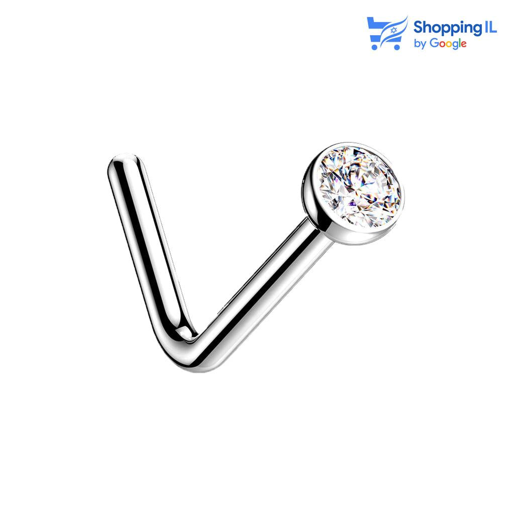 נזם עשוי טיטניום בעיצוב ר למניעת נפילה של העגיל, מושבץ באבן קריסטל מקולקציית עגילי הנזם של לאבאסעגיל נזם מכופף -  עשוי טיטניום TITANIUM 6AL-4V-ELI ASTM F-136. העגיל בעיצוב נזם נקודה קטנטנה עם מוט מכופף למניעת החלקה של העגיל. צבע - כסוף כהה מידה - מגיע בעובי של 0.8 מ"מ ואורך המוט הוא 6 מ"מ | קוטר הנקודה היא 2 מ"מ  העגיל מיועד בעיקר לאזורים הבאים: - פירסינג נזם